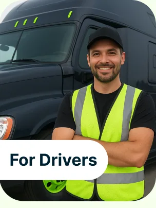 A driver beside a truck